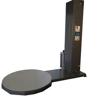 A black industrial wrapping machine with a round platform.