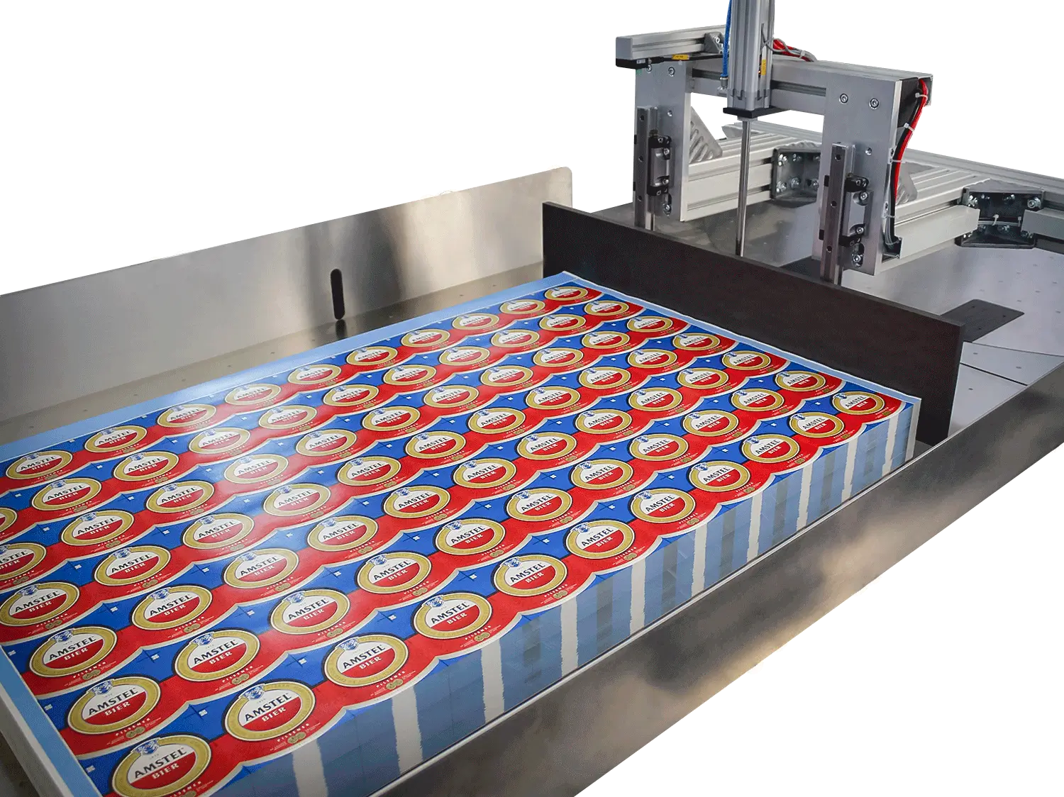 Rows of packaged products on a conveyor belt in a factory.