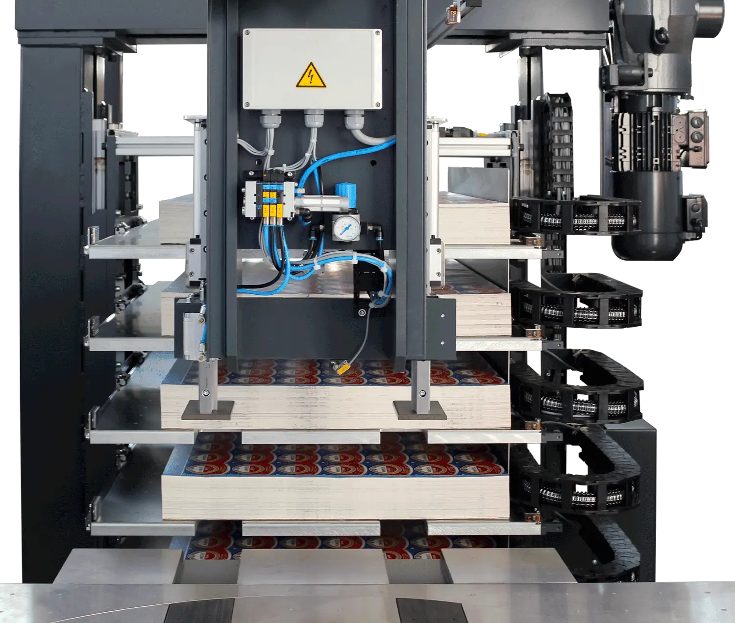 Industrial machine processing stacked electronic components.